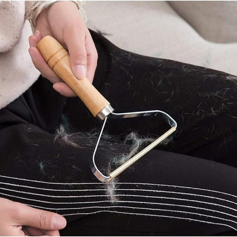Appareil anti-peluche portable